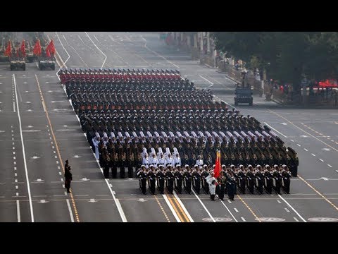 Fifteen military units march in formation for National Day parade