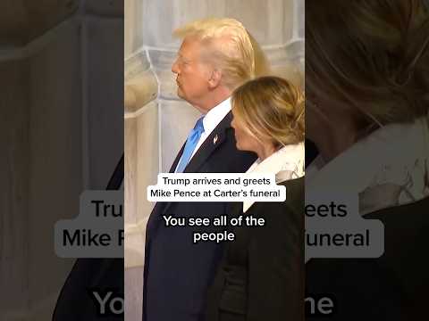 Trump arrives and greets Mike Pence at Carter's funeral